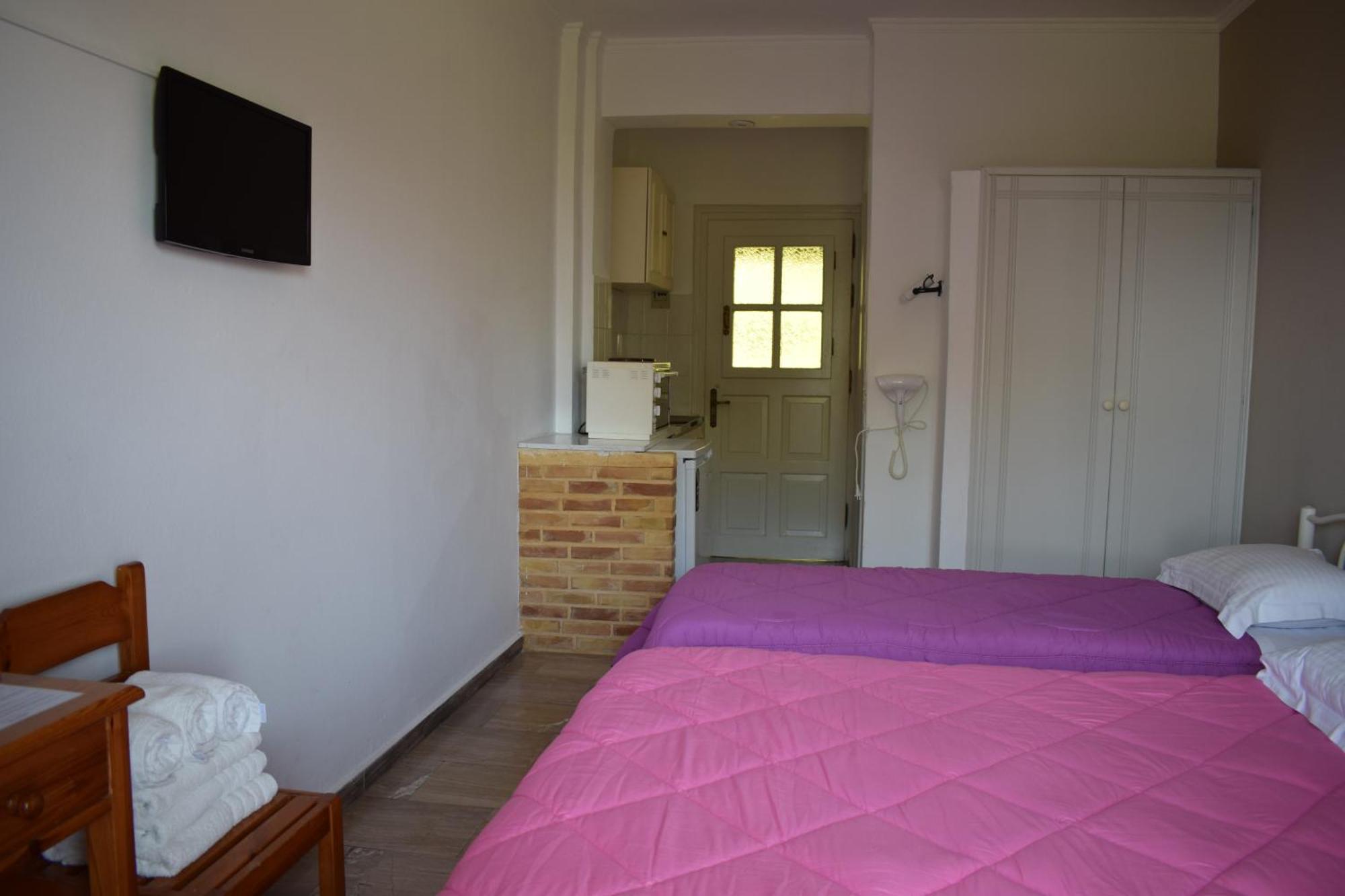 Rising Sun Apartments & Studios เวนิทเซส ห้อง รูปภาพ